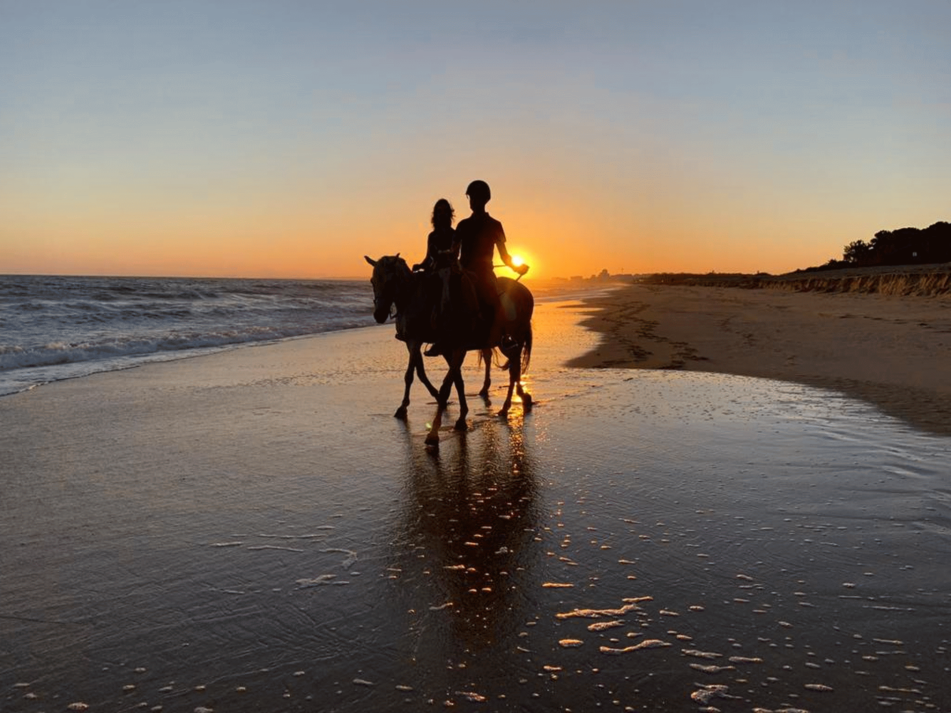 Sunset Horse Riding on the Beach